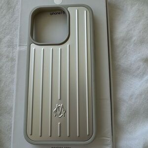 Rimowa iPhone 15 pro case. Box included